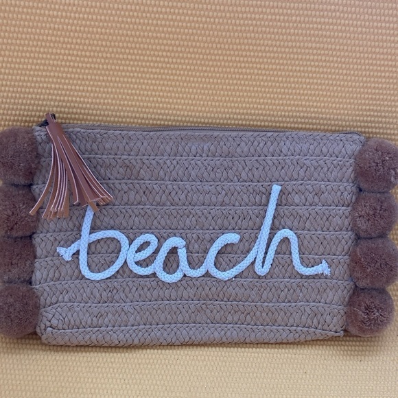 Beach Days Pom Pom Oversized Straw Clutch, Natural zipper closure 
10” x 7” - Picture 6 of 6